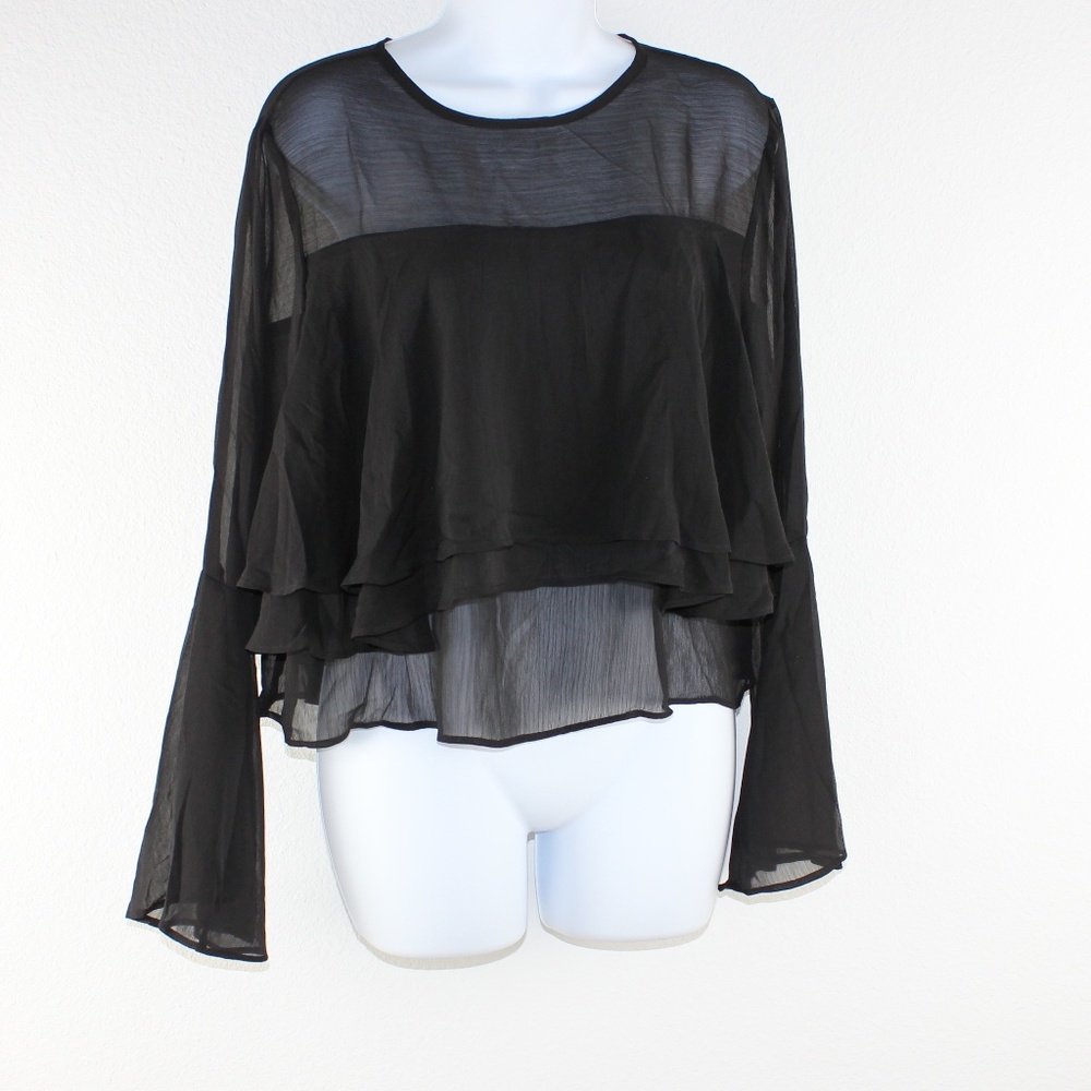 Black ruffled blouse